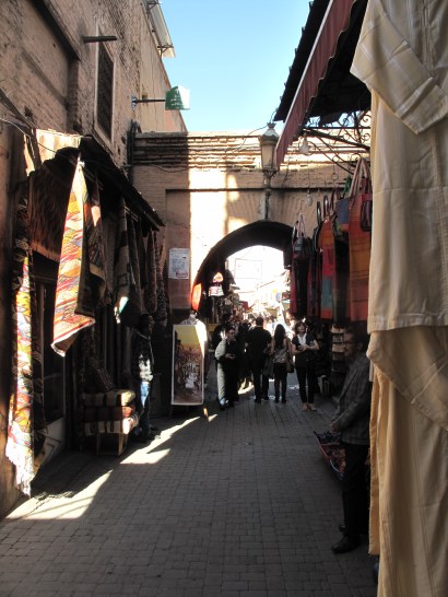 'Colored cottons hang in the air Charming cobras in the square'